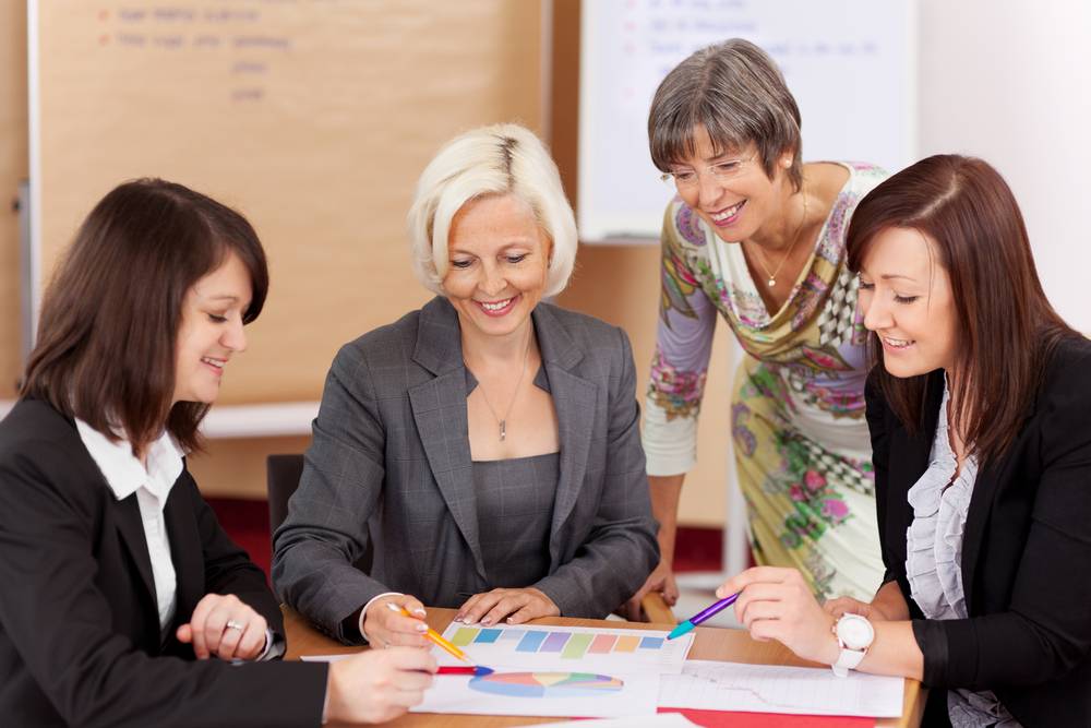 Four women in a meeting